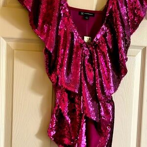 A new sequin fuschia top large size